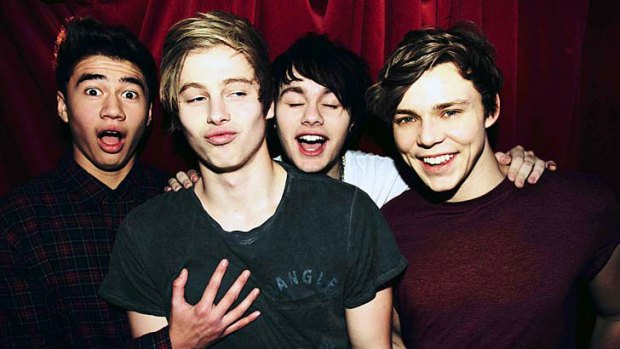 Summer loving: Sydney teenagers 5 Seconds of Summer are supporting One Direction on their world tour.