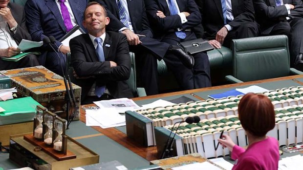 A continuing "witch-hunt" ... Opposition Leader Tony Abbott and Prime Minister Julia Gillard during Question Time in Parliament.