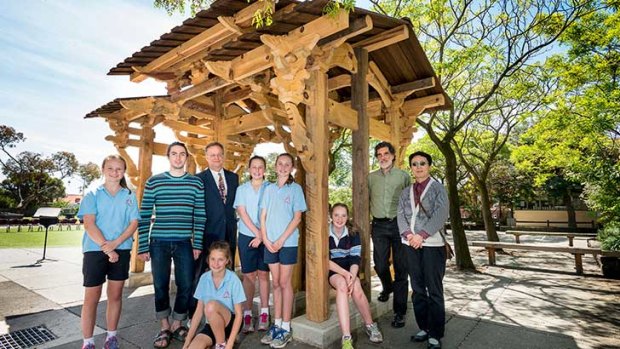 Students from Malvern Primary School with second-year Masters of Architecture student William Cassell; Dean of Architecture, Building and Planning Professor Tom Kvan; Studio Co-ordinator Hamish Hill; and subject co-ordinator Professor Qinghua Guo. Photo: Richard Timbury.