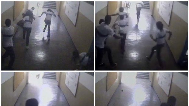 A combination picture of images taken from a security camera video distributed by the Rio police shows students running from the classroom where gunman Wellington Menezes de Oliveira, 24, opened fire.