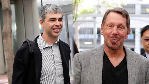 Larry Page, chief executive officer at Google, left, and Larry Ellison, chief executive officer at Oracle, arrive at court in San Jose, California..