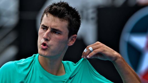 Bernard Tomic on his way to defeating Germany's Florian Mayer in the Sydney International.