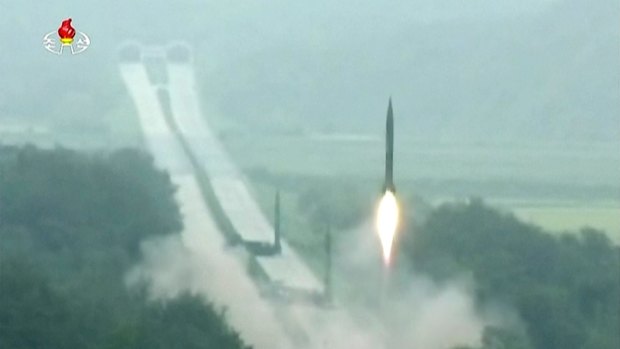 A missile is launched during a drill at an undisclosed location in North Korea. 