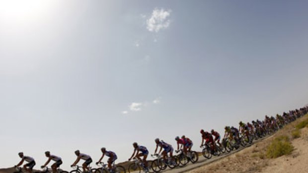 Downhill respite ... the peloton on the charge in the third stage of the Tour of Oman.