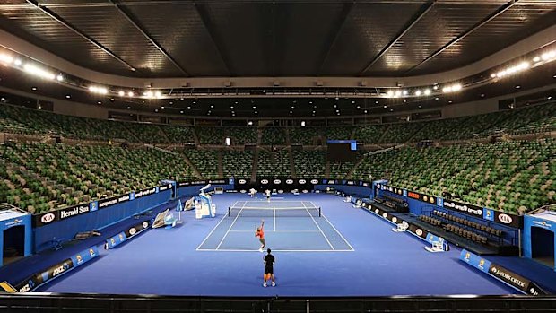 Serena Williams serves during a practice session at Melbourne Park on Monday.