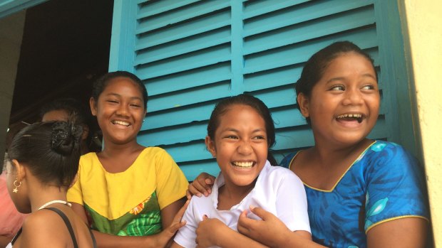 Tuvaluan girls outside church.
