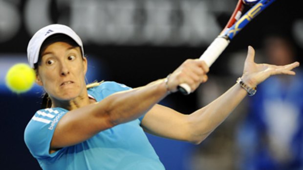 Justine Henin overcame fifth seed Elena Dementieva 7-5, 7-6 (8-6) in a high quality second round match.