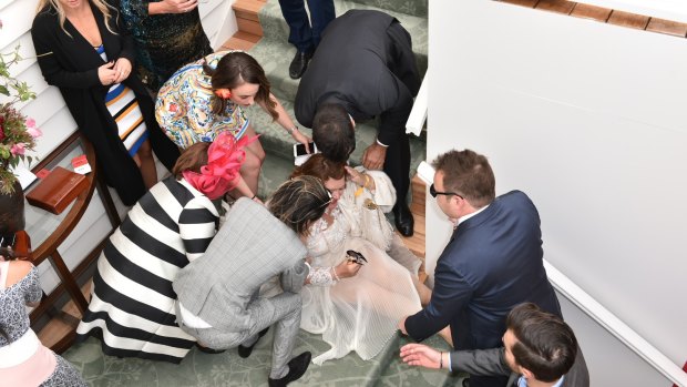 Gina Rinehart took a spill down a flight of stairs in the Emirates marquee.