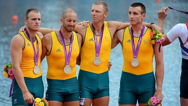 The emotion hits ... Australia's men's four - William Lockwood, James Chapman,  Drew Ginn and Joshua Dunkley-Smith.
