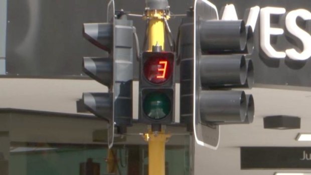 Pedestrian timers on the traffic lights at the intersection of William and Murray Streets in Perth.
