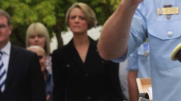 Tough tune for a campaign ... Kristina Keneally opens a police station in Granville yesterday.
