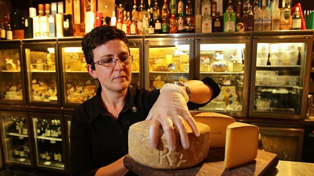Taste test ... Sonia Cousins, a fromager at the GPO Cheese and Wine Room, and the new raw milk C2 cheese.