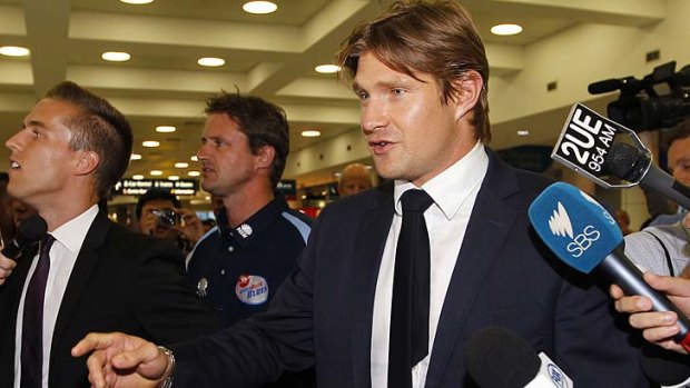 Under fire: Shane Watson speaks to the media on his return.