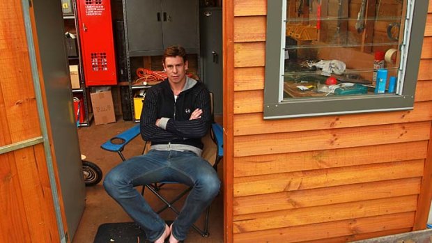 Saint's haven: Justin Koschitzke in his shed complete with St Kilda locker.