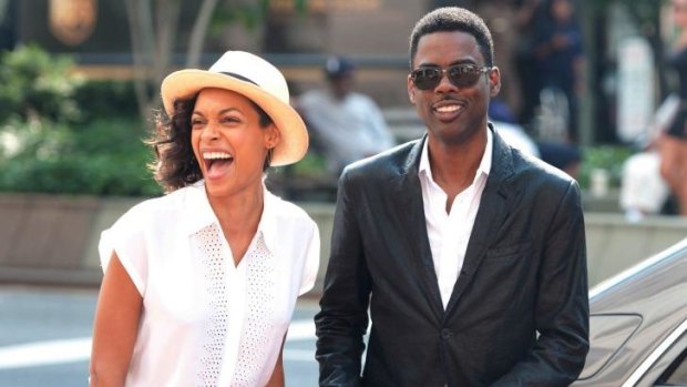 Reporter and subject: Rosario Dawson and Chris Rock negotiate the publicity trail, to entertaining effect.