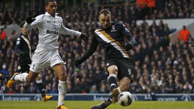 Fulham's Dimitar Berbatov scores the winner against Tottenham.