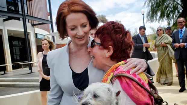 Julia Gillard is hugged by Irma Cosentino.