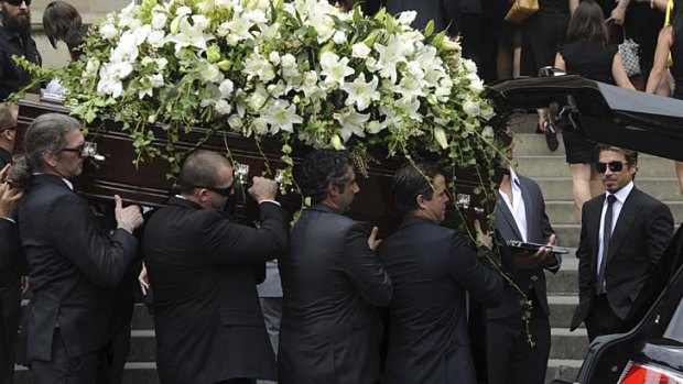 Mourners attend the funeral of James Miller at St Mary's Cathedral, Sydney.