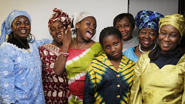Women of the Kankelay choir find that singing helps them forget the many hardships they have had to overcome.