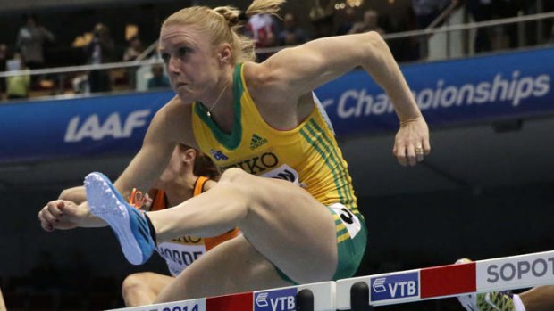 Record pace: Australia's Sally Pearson clears a hurdle in a women's 60m hurdles in Sopot, Poland.