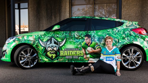 Sue Washington loves nothing more than Canberrans taking selfies with her little green pocket rocket.