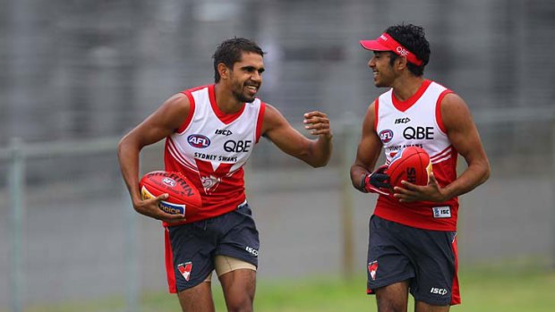 Dedicated ... Swans speedster Lewis Jetta shares a laugh with teammate Byron Sumner at training this week.