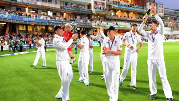 England players celebrate on the Oval after winning the Ashes.