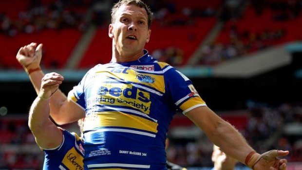 Danny McGuire celebrates after scoring a try that helped Leeds win its first Challenge Cup final in seven attempts.