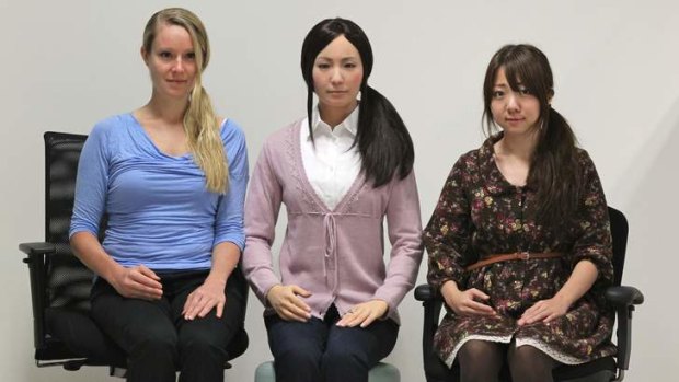 Kerstin Haring, PHD student from Reasearch Centre for Advanced Science and Technology, Tokyo , android- Actroid-F, and Kaori Tanaka a graduate student at University os Tsukuba.
