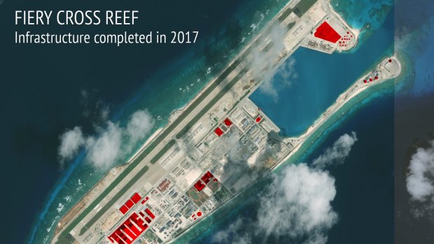 This image provided by CSIS Asia Maritime Transparency Initiative/DigitalGlobe shows a satellite image of Fiery Cross Reef in Spratly island chain in the South China Sea, annotated by the source to show areas where China has conducted construction work above ground during 2017.