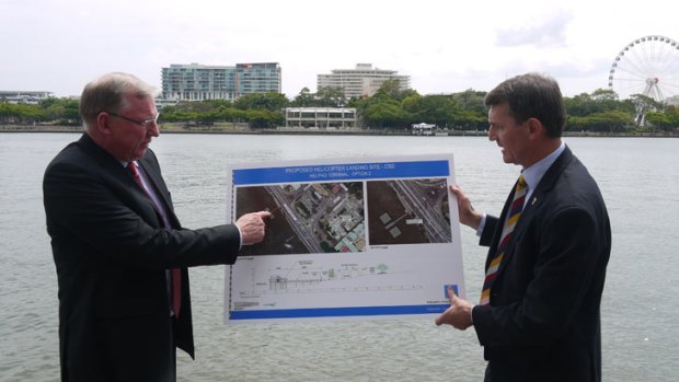 Acting Premier Jeff Seeney and Lord Mayor Graham Quirk show off the plan for a $9 million helipad in the CBD.