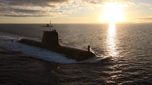 Into the sunset ... HMAS Dechaineux, a Collins Class submarine.