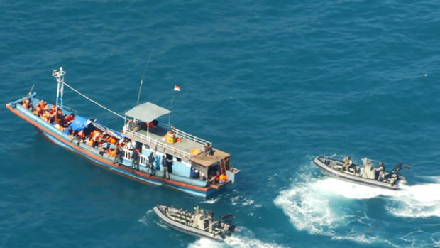 A boat carrying seven asylum seekers was intercepted  off the WA coast north of Ashmore Island  yesterday. A second boat, carrying 72 people, was also intercepted, west of Bathurst Island north of Darwin.
