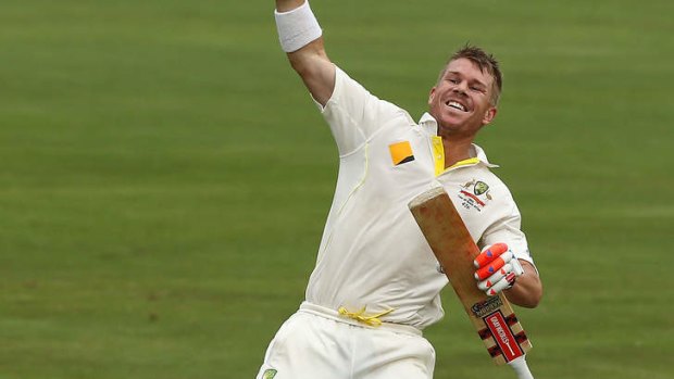 David Warner celebrates his century on day 3 of the first Test against South Africa.