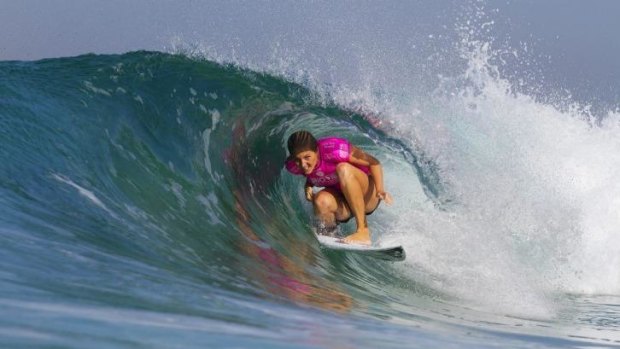 Stephanie Gilmore rides the barrel of a wave during round 2 of the Billabong Pro Rio surfing competition on Thursday.
