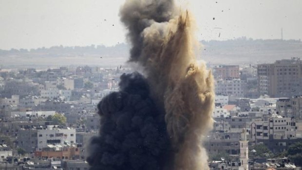 Smoke and sand after an Israeli air strike in Gaza.