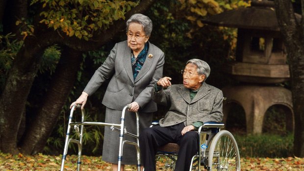 Prince Mikasa, right, and his wife Princess Yuriko, left, talk at their residence in Tokyo a year ago.