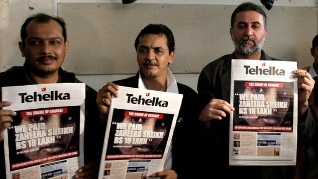 Facing charges: The editor of Tehelka Tarun Tejpal, far right.