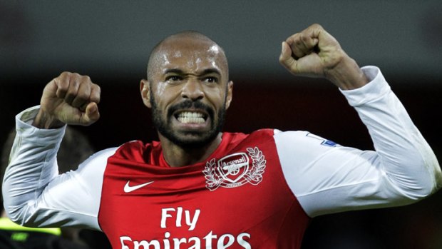 Golden goal ... Thierry Henry celebrates his goal.