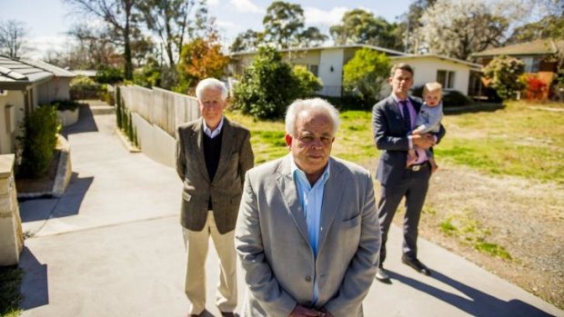 : From left, Maurice Deveze, David Templeman and Stephen Gaffey, with his son, Jim, are unhappy with  a development application for consent to replace a four-bedroom property with four double-storey townhouses.