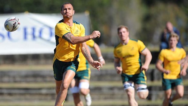 Who's afraid ... Quade Cooper fires off a pass at training with the Wallabies on the Gold Coast last week.