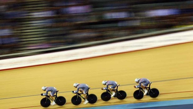 Hot wheels: Australia's men's pursuit team rides to first place in qualifying in a pre-Olympic hit-out.