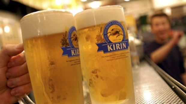 A barman prepares to serve Kirin beer to customers at a bar in Tokyo. Asia is now the world's biggest beer producer.