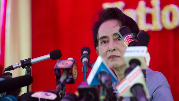 Myanmar's opposition leader Aung San Suu Kyi addresses the media at a press conference at her home in Yangon, Myanmar, on Thursday, before Sunday's elections.