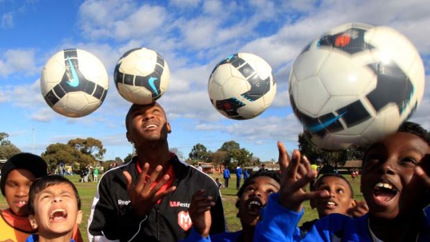 Melbourne Heart player Kamal Ibrahim with Abdi Goud, 12,  Musab Alotaibi, 12, Khalid Aden, 11, Khadar Sheikh, 10, Mahad Weli, 12.