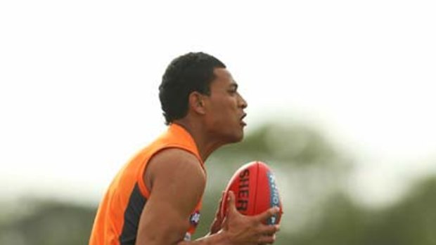 Israel Folau takes a mark during a training session at Blacktown Olympic Park.