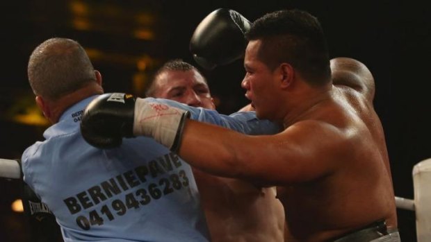 The referee intervenes in Paul Gallen's fight against Herman Ene-Purcell 