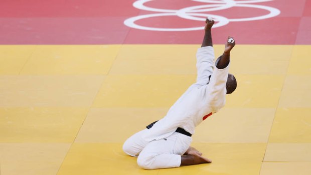 France's Teddy Riner celebrates after winning the men's judo heavyweight final.