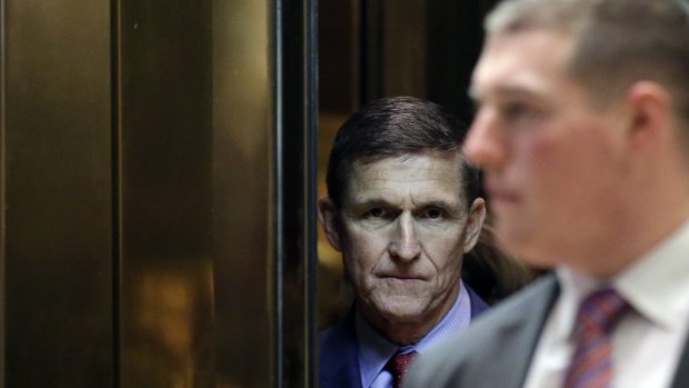 General Michael Flynn, White House national security adviser-designate, stands in the elevator at the Trump Tower.