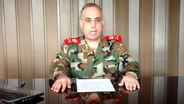 General Abdel Aziz Jassem al-Shallal, commander of the Syrian military police, announces his defection on YouTube.